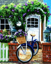 Велосипед у цветущего крыльца