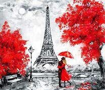 Пара под красным зонтом в осеннем Париже